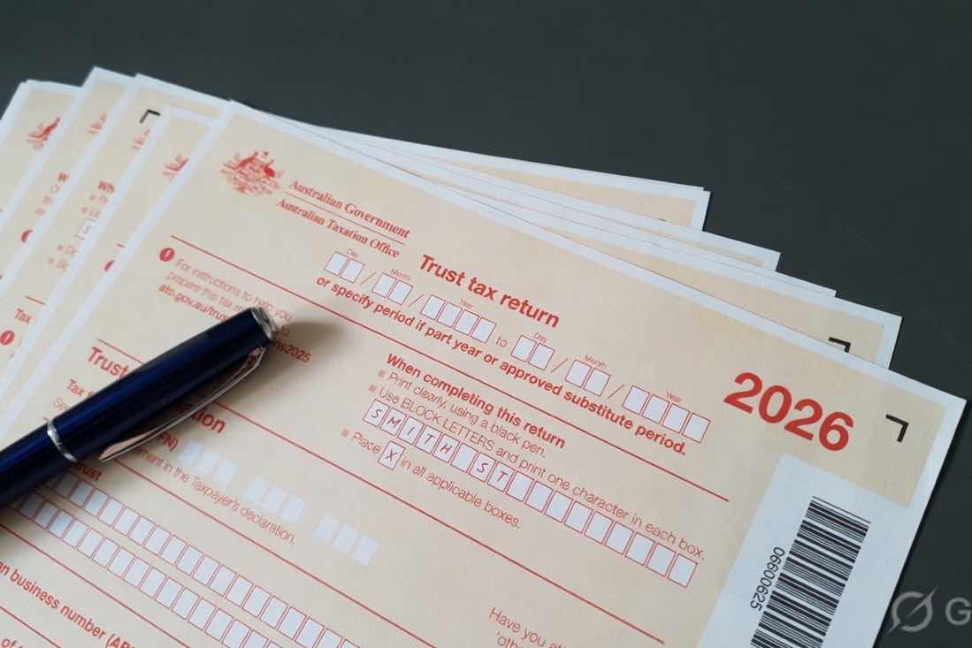 Australian trust tax return form on a desk, illustrating the 2026 Budget 30% minimum tax changes for discretionary trusts