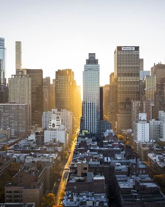 City skyline at sunset representing Australian expat tax clients living and working overseas