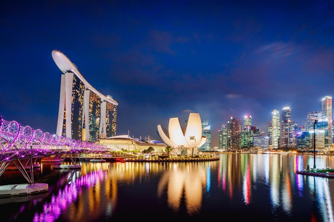 Singapore Marina Bay skyline at dusk, representing Australian relocation to Singapore after the 2026 Budget changes to capital gains tax.